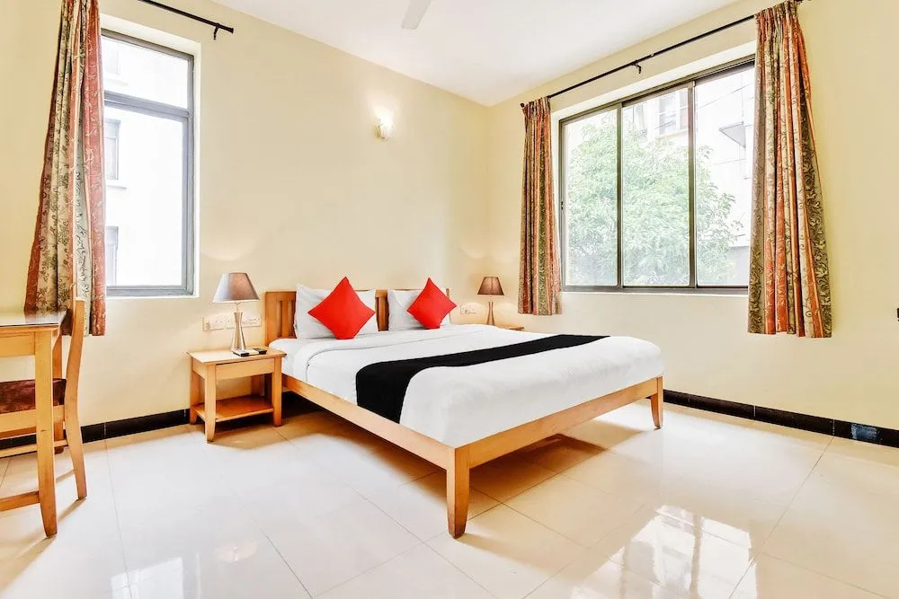 Capital O 49932 Orchard Suites