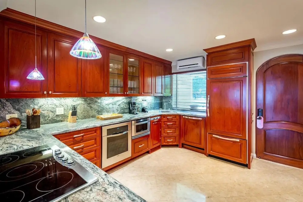 Stylish Split-Level Condo with a Shaded Terrace, Direct Beach Access, and Resort-Style Community Amenities