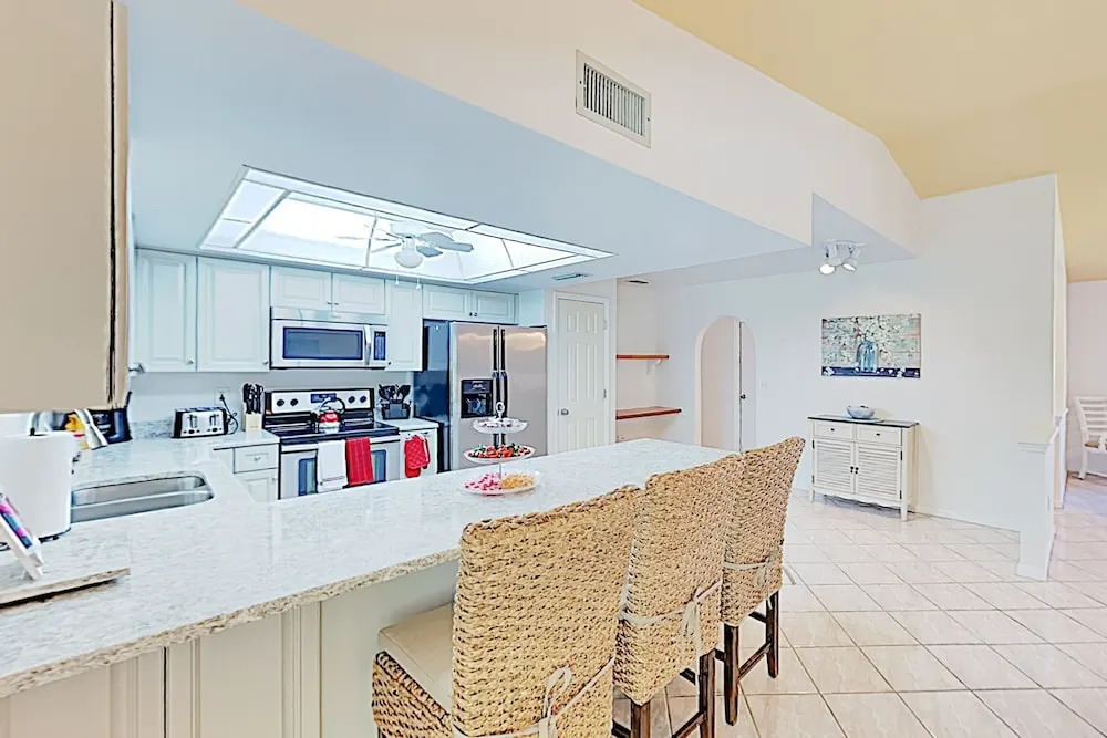 New Listing! Sparkling W/ Caged Pool & Lanai 3 Bedroom Home