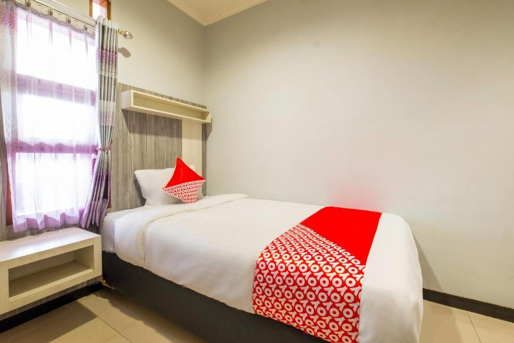 Karins Guesthouse Syariah RedPartner