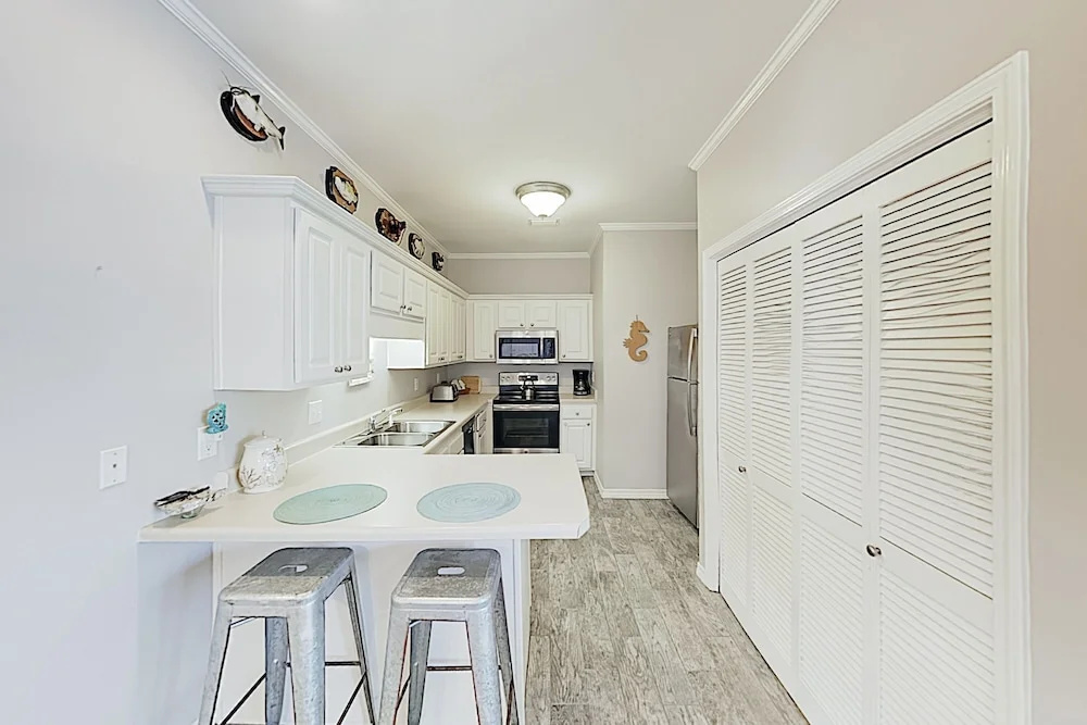 New Listing! Chic West Beach W/ Pool 2 Bedroom Condo