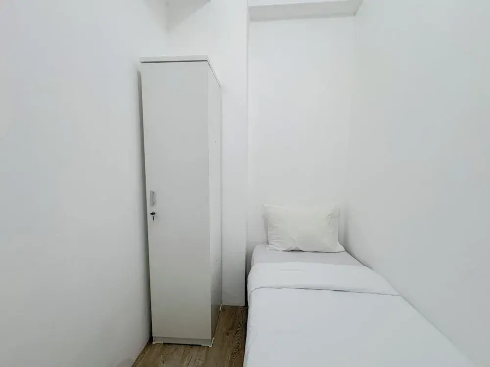 Compact and Restful 2BR at Menara Rungkut Apartment