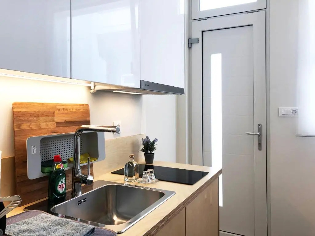 Sunny micro-loft apartment with outdoor lounge