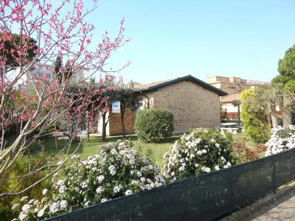 Seaside villa surrounded by a garden