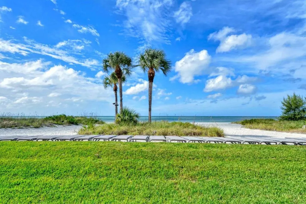 LaPlaya 105B-Relax on the balcony and watch the dolphins swim by and the pelicans dive!
