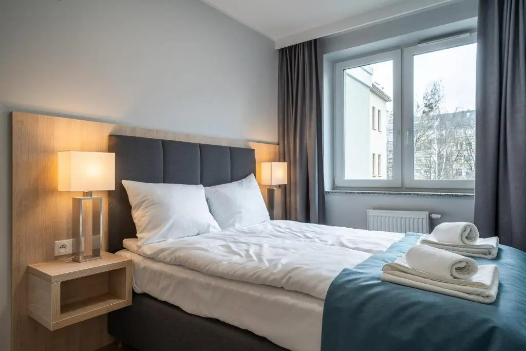 Q19 Apartments Rynek