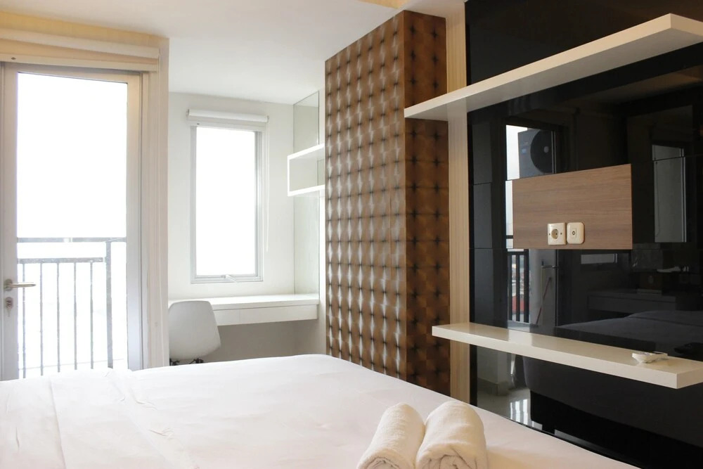 Homey 2BR Apartment at Sudirman Suite