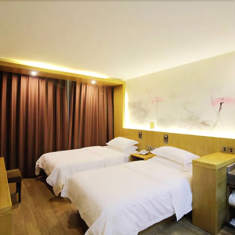 Junpin Coastal Hotel (Qingdao Railway Station Subway Station Zhanqiao Branch)(君品海岸酒店（青岛火车站地铁站栈桥店）)