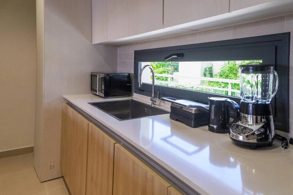 Modern and Spacious Condo Steps From the Beach