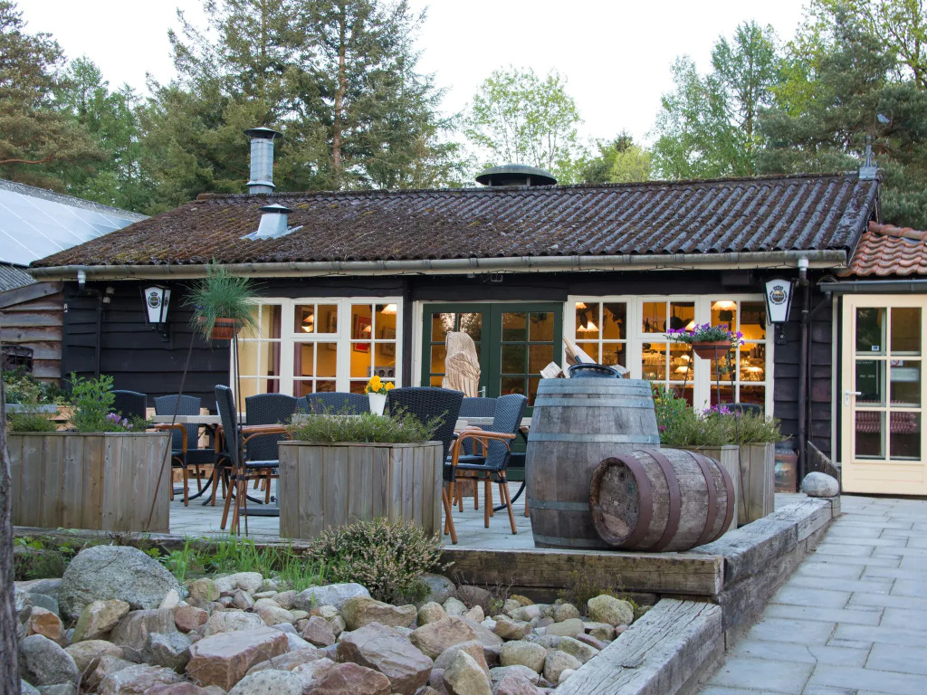 Spacious villa with sauna and hot tub, in a holiday park near a National Park
