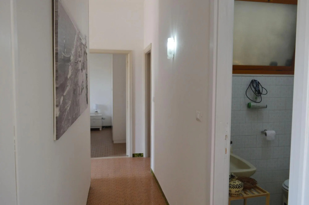 Holiday home on the Torregrande seafront, 30 meters from the seashore-Casa delle Palme