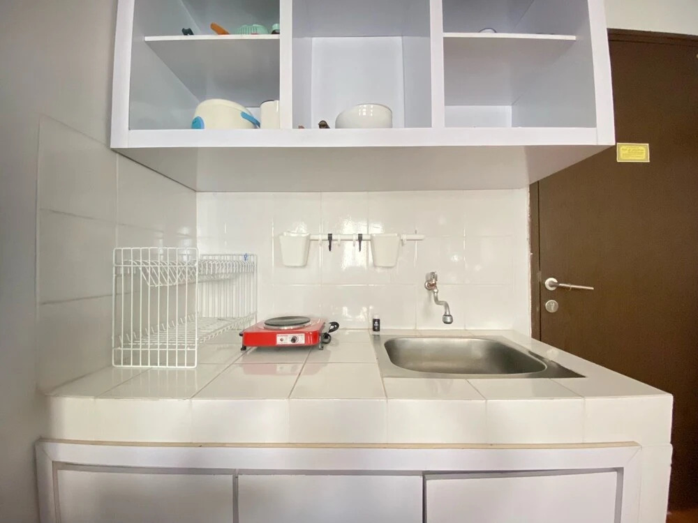 Modern Designed 2BR at Suites @Metro Apartment By Travelio