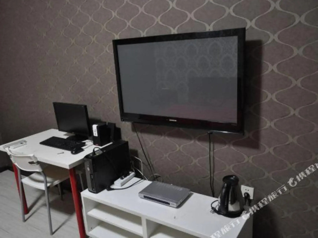 Tangtang Theme Apartment Holiday Hotel