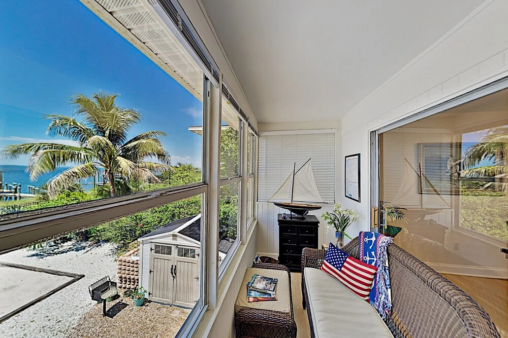 The Pelican & Dolphin: Bayfront W/ Dock 3 Bedroom Home