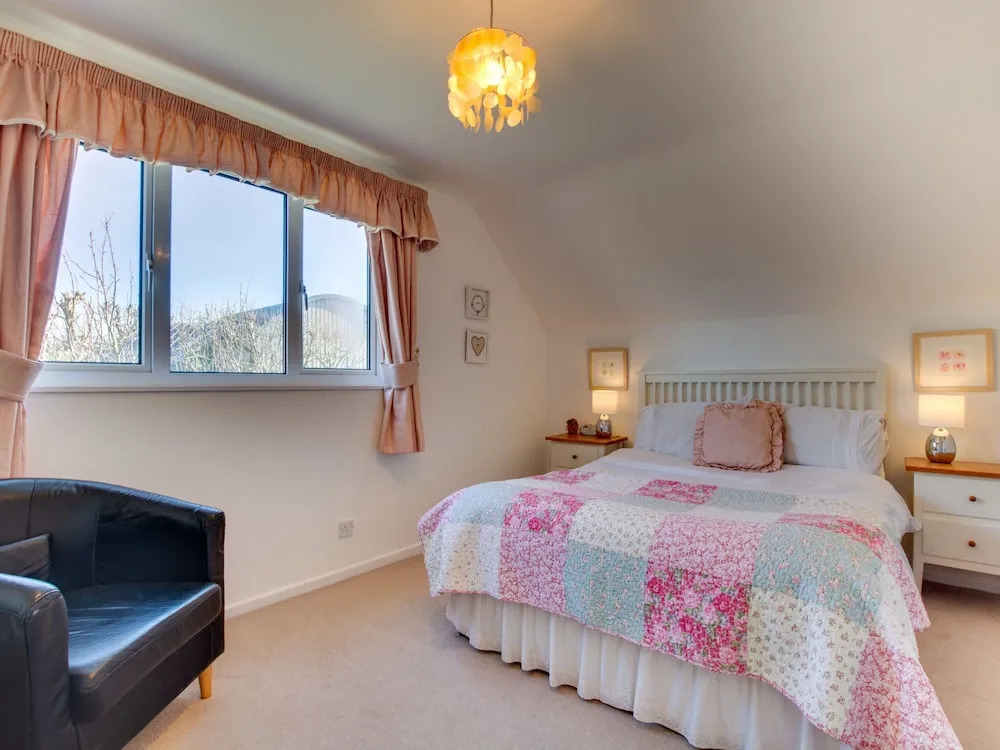 Detached Holiday Home With a Colourful Garden, Stove and Cosy Furnishings