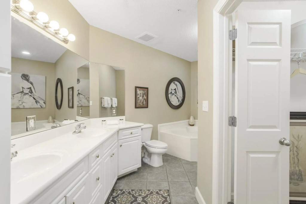 Condo on bay with boat launch and multiple pools
