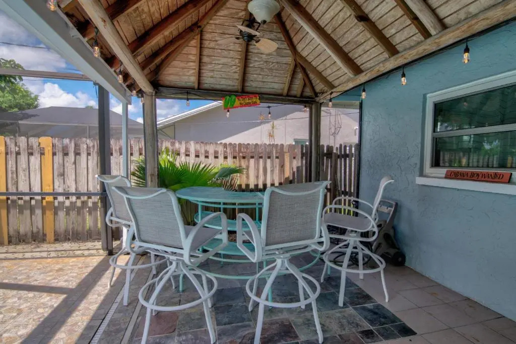 Salt Water Heated Pool Home with a Tiki Bar, a Garage Game Room and 4 Bikes