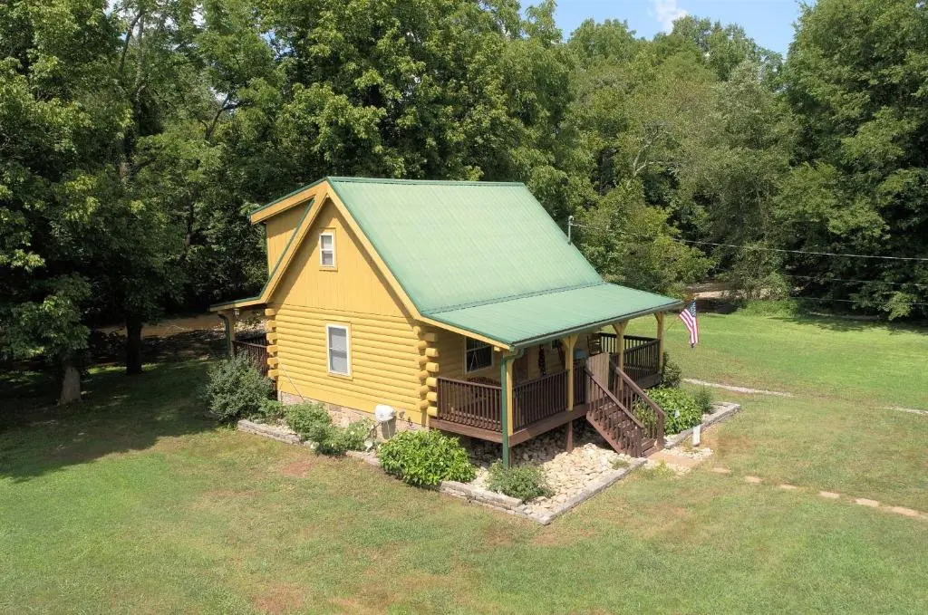 Yellow Cabin on the River