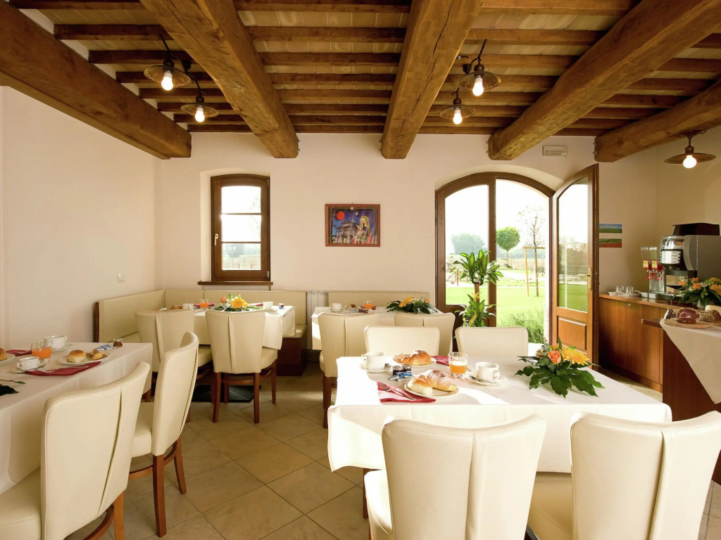 An agritourism complex with views of Assisi.