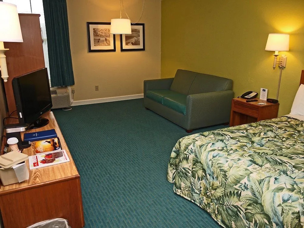 NEW 2026-Ocean Sands Beach Boutique Inn-24Hr Sauna and Salt-Mineral Pool-Free Beach Bikes and Famous Beach-Fresh Baked Cookies-Popcorn-In Room Bathrobes-Sunscreen-65 Inch TVsNetflix-Bedside Candy-Free Laundry- 4 Grand Black Beds-Call & Save-1-252-AHA-SAND