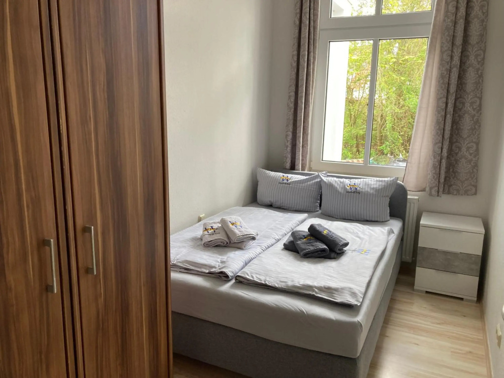 Ferienwohnung 4 Rosenbogen - Familienwohnung mit Wintergarten und Terrasse