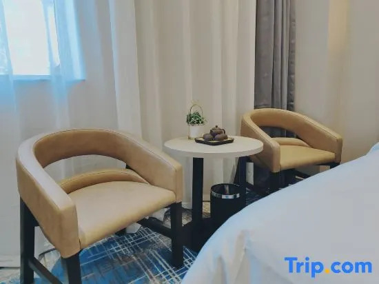 Zhangzhou Happiness Hotel (Gucheng Niuzhuang Branch)