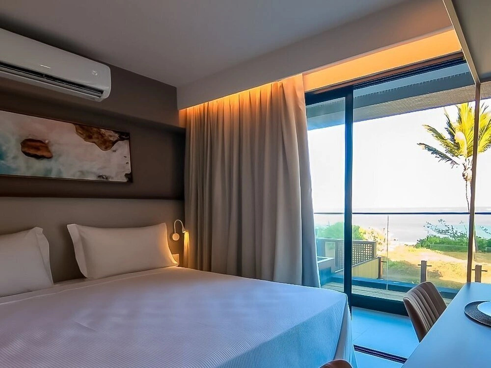 Restinga by Xtay - Studios com piscina e academia, pé na areia em João Pessoa