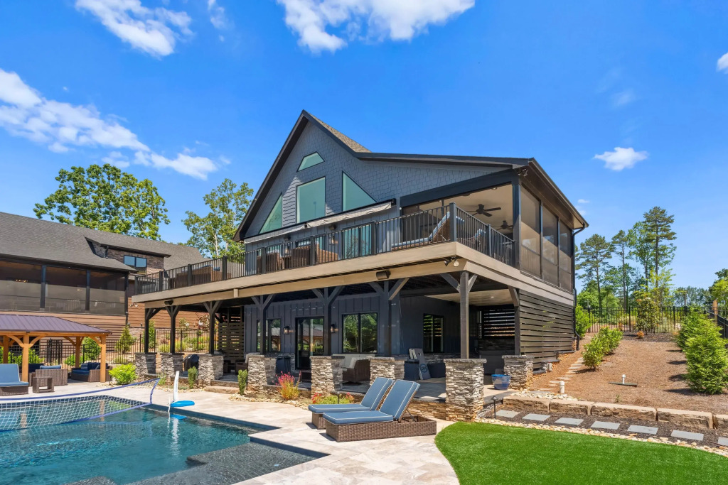 Luxe Lakefront Lodge w/ Pool, Hot Tub, Theater & Private Dock Sleeps 21