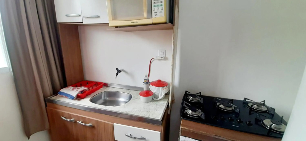 KITNET S2 em TORRES-RS - Na mais bela praia Gaúcha - Cozinha - Banheiro - Ar condicionado - TV smart 32 - Wi-Fi - Estacionamento - Anfitriã Superhost no BnB