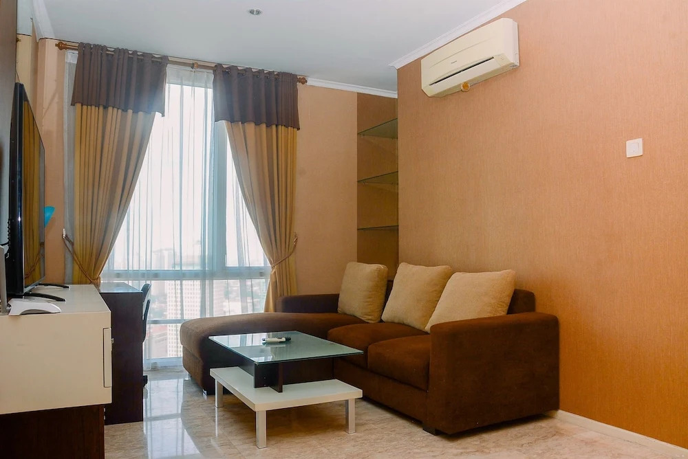 Modern 2 BR Apartment @ FX Residence with City View By Travelio