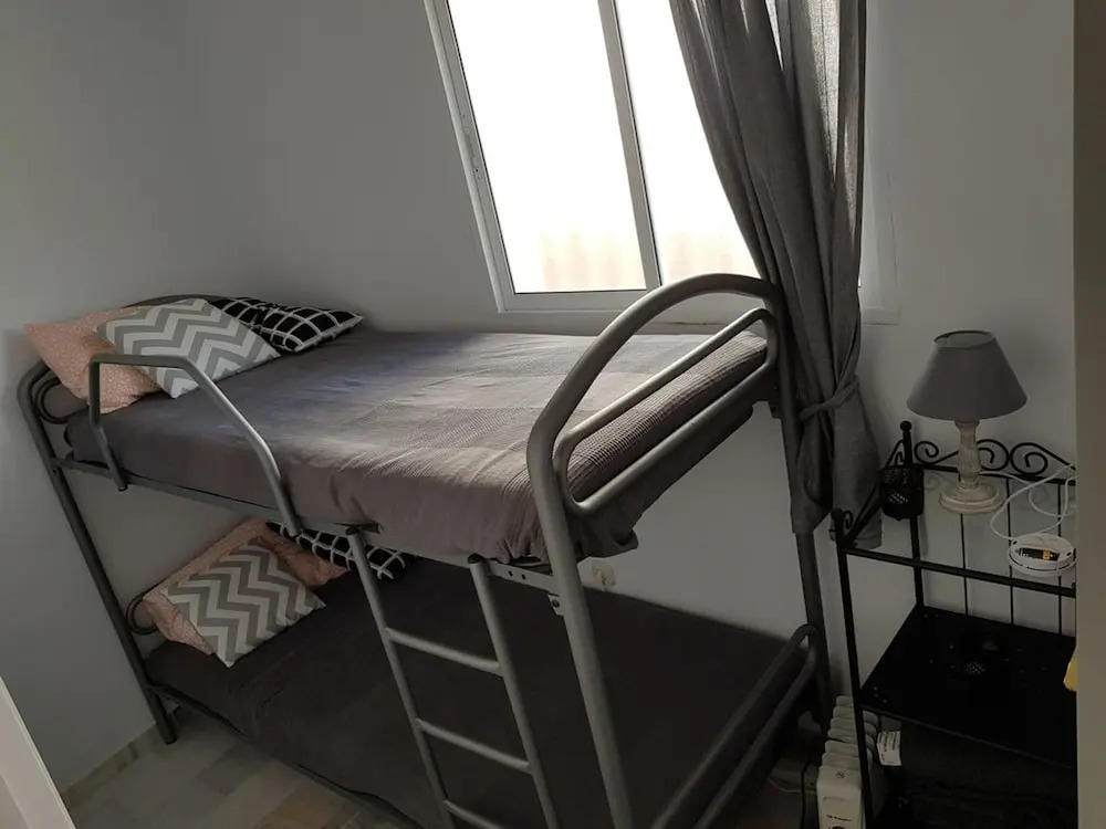 Sunny and spacious apartment with own entrance to pool
