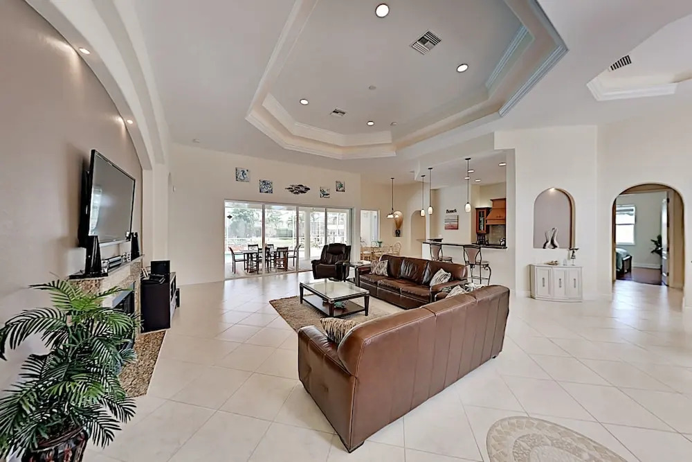 Upscale All-suite Canal W/ Dock & Fireplace 4 Bedroom Home