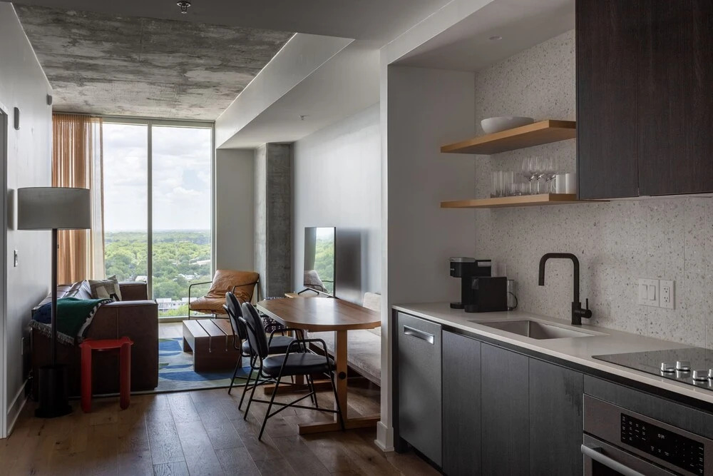 20th floor condo with pool on Rainey St by Locale