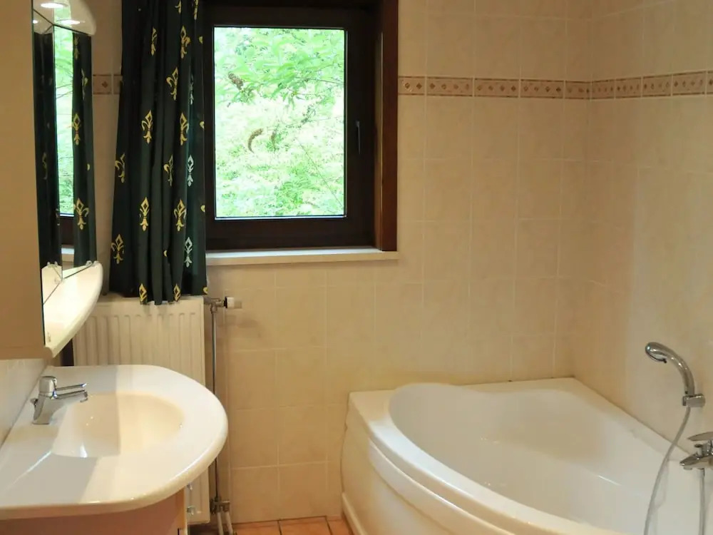 Holiday Home with Hot Tub & Steam Room in Forest