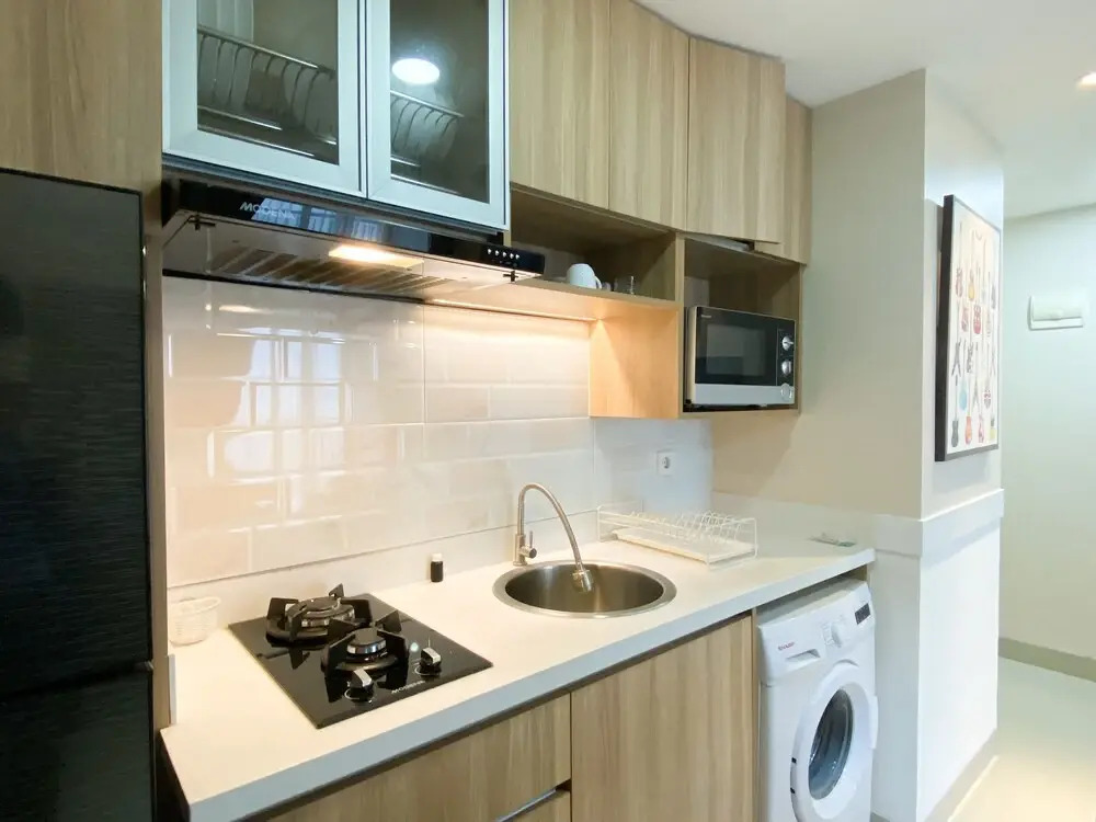 Cozy and Minimalist 2BR at 8th Floor The Oasis Cikarang Apartment By Travelio