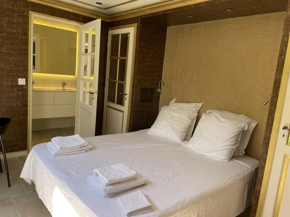 Chambre Luxe Piscine Jardin vue Solarium Palmeraie