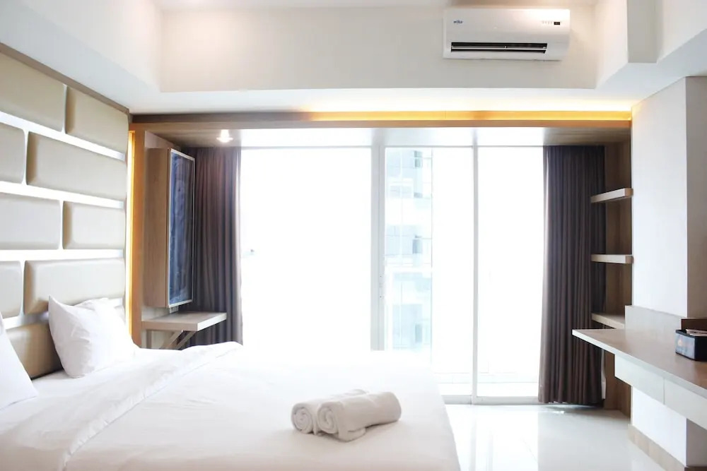 Trendy & Comfy Studio at Tamansari la Grande Apartment