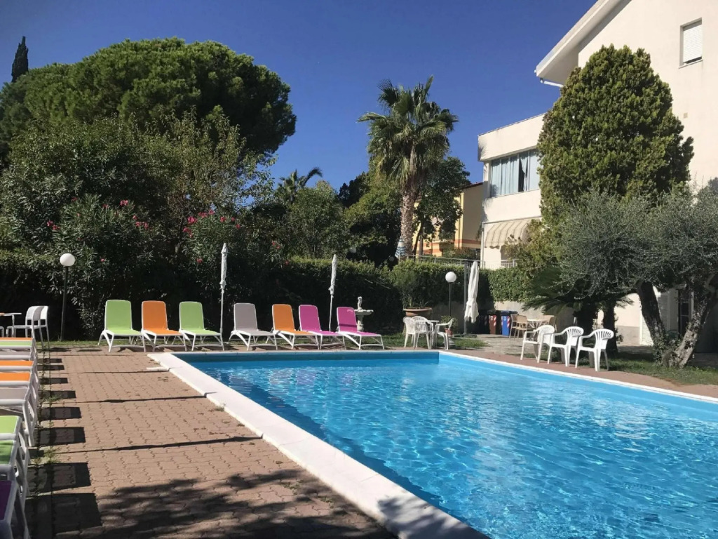 Snug holiday home in Loano with shared pool