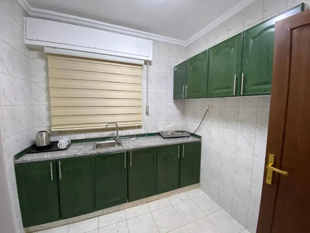 Al-Farouq Suites