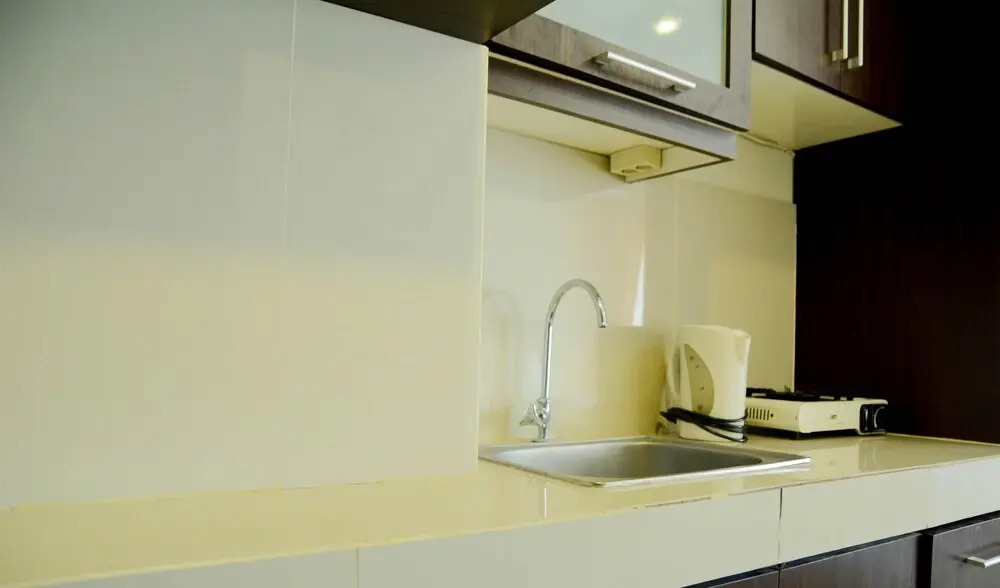 Simply Studio Room Atria Residence Apartment near Summarecon Mall By Travelio