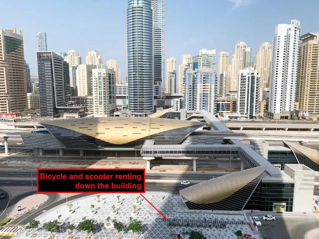 Luxury new apartment on the metro, facing Dubai marina.