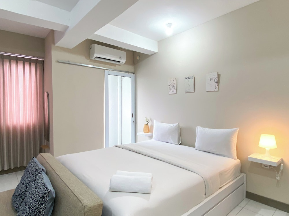 Minimalist And Homey Studio At Grand Kamala Lagoon Apartment
