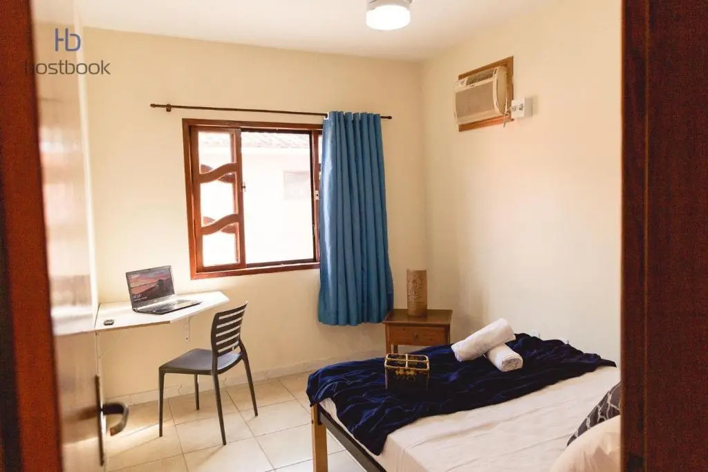 Casa a 400 m da praia do centro - WIFI 200MB - Garagem - TV 500 canais - 2 Quartos - Cozinha equipada - Churrasqueira