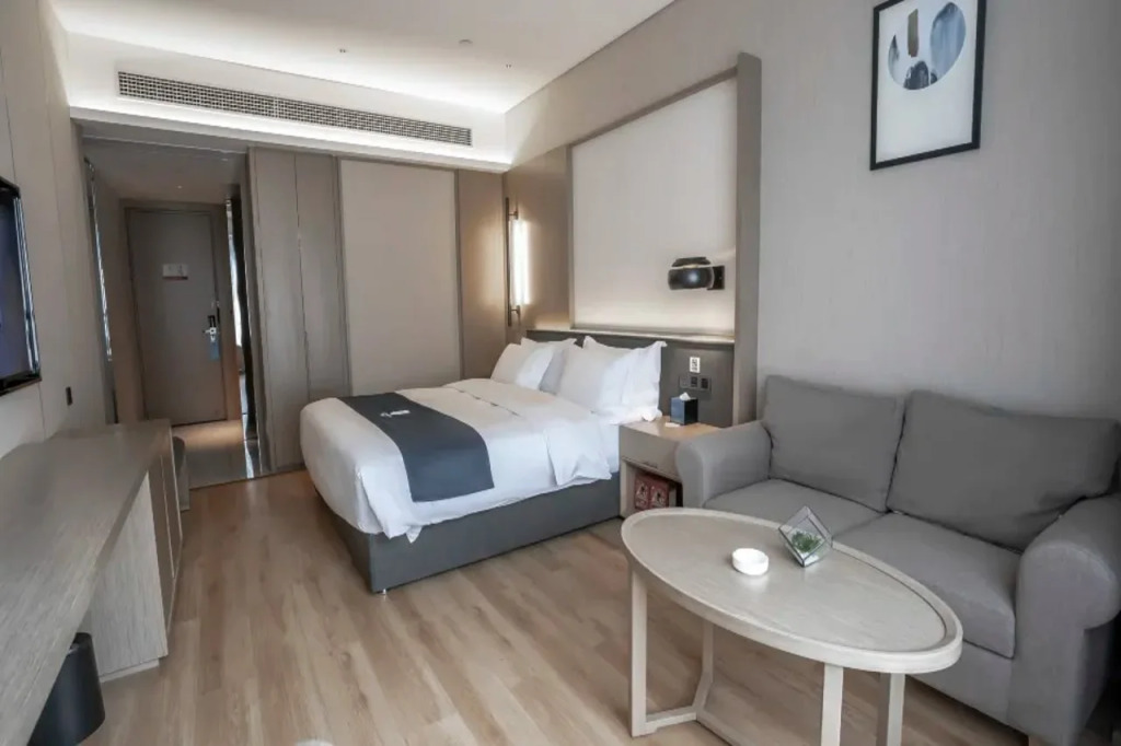 Echarm Hotel (Leibo tourism passenger transport center station)