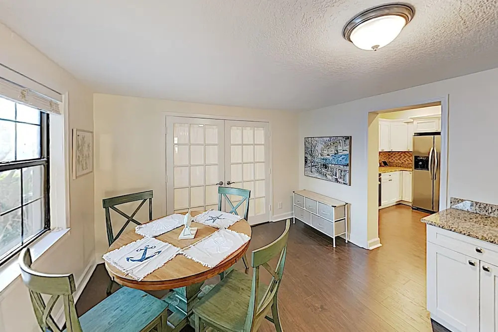 Updated W/ Gated Pool & Screened-in Porch 4 Bedroom Home