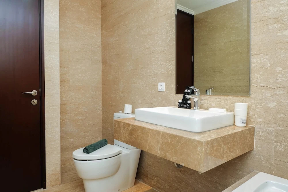 Highest Value Studio Room at Menteng Park Apartment By Travelio