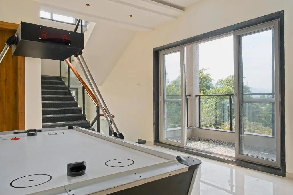 SaffronStays The Fusion, Lonavala - pool villa with hip interiors and indoor games