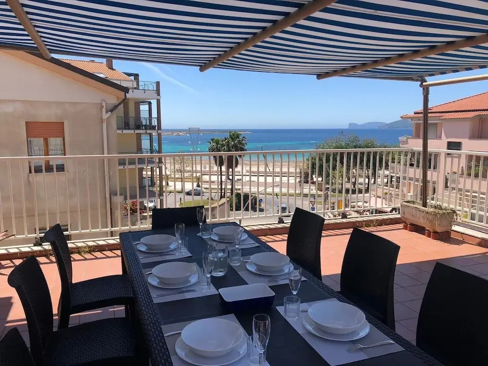 Alghero, Lighthouse Penthouse with sea view and beach front