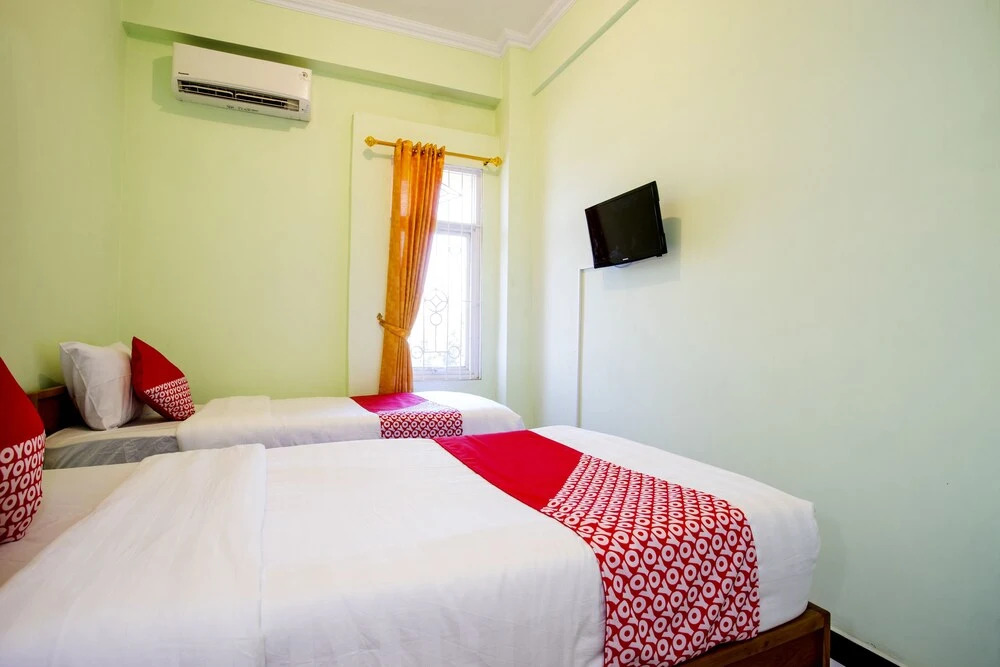 Rhona Guest House Syariah by OYO Rooms