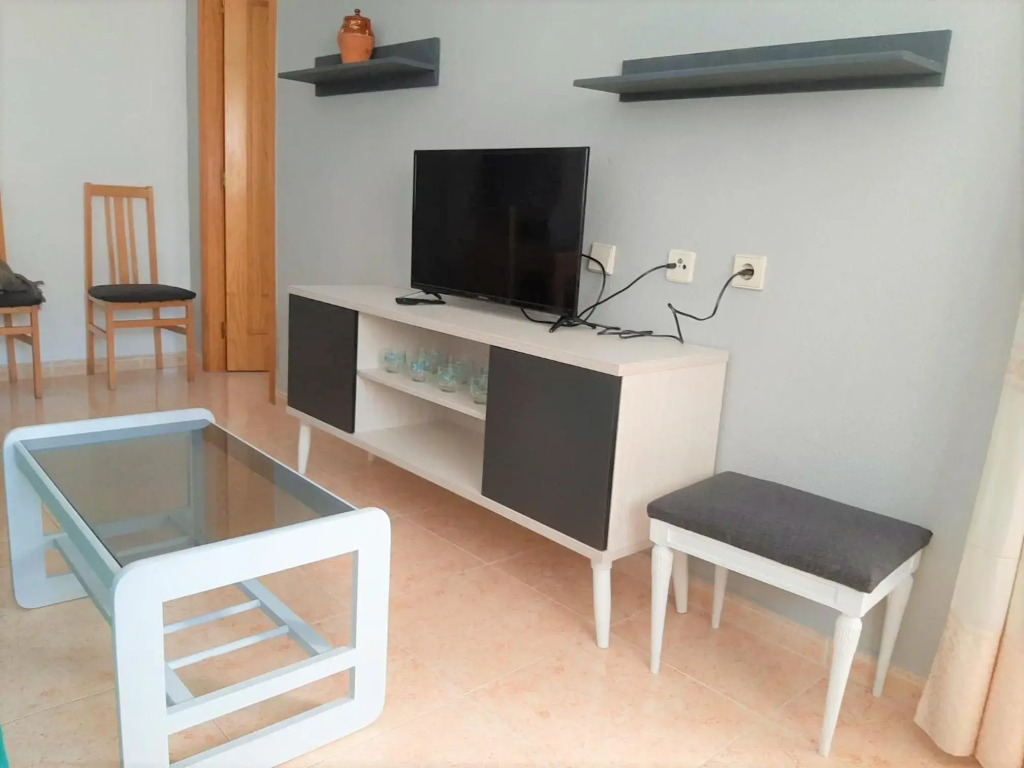 apartamento soleado, 1 dormitorio con balcón, piscina y garage